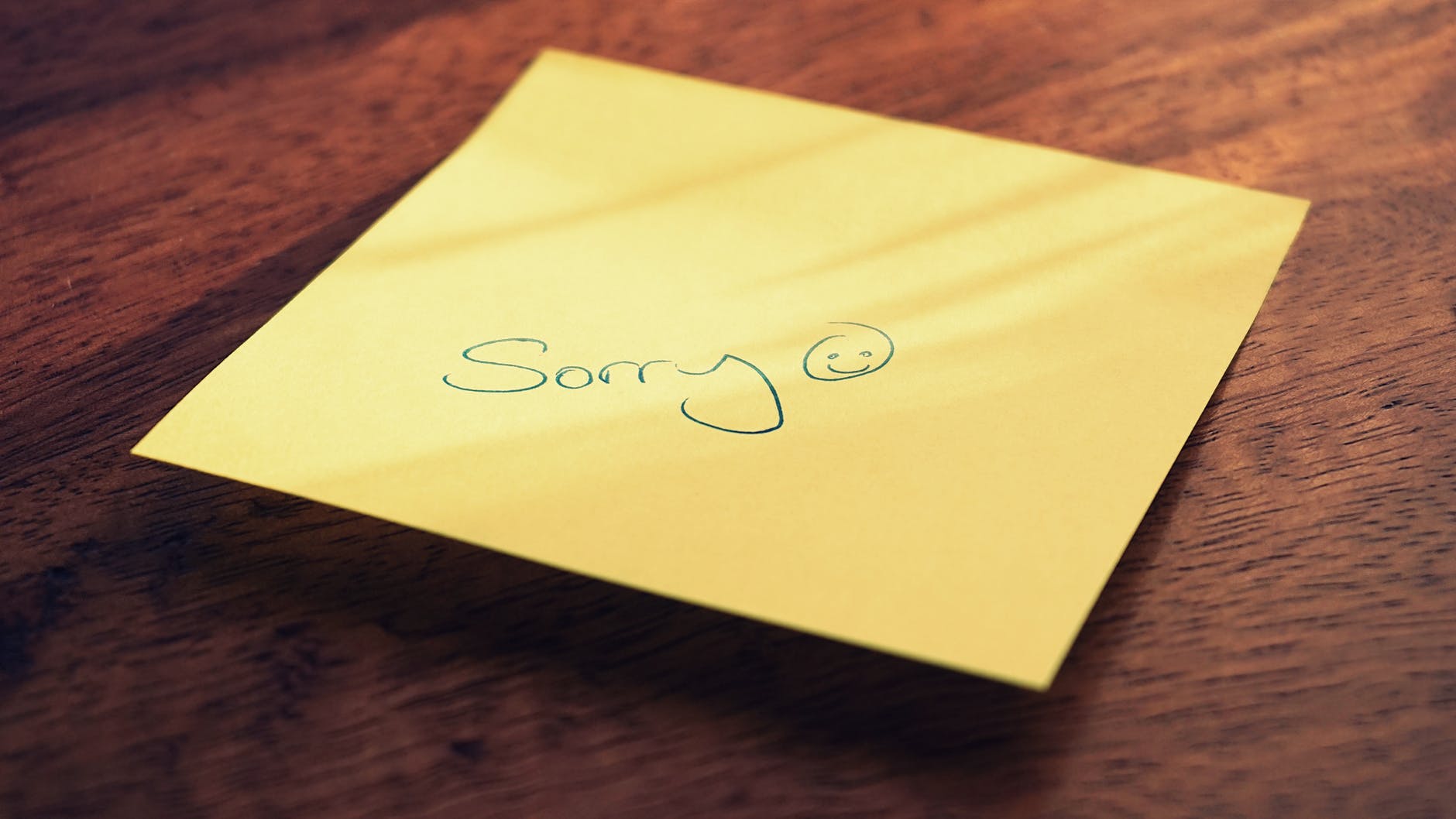 sticky note with apology